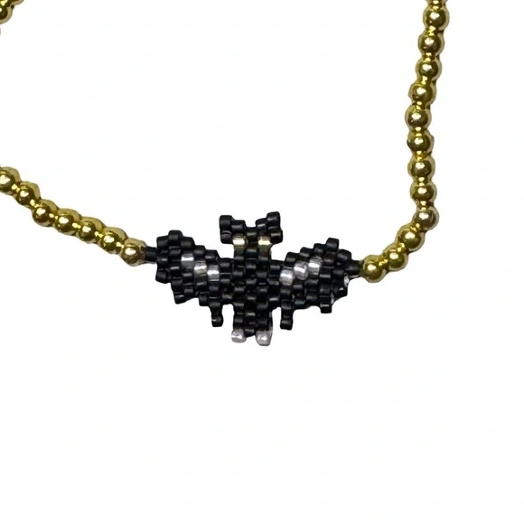 Handcrafted Black and Gold Beaded Bat Stretch Bracelet - Picture 3 of 5